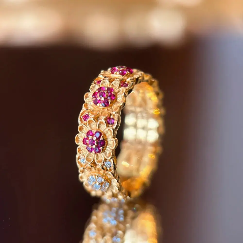 Brushed sunflower with red corundum and white diamonds index ring