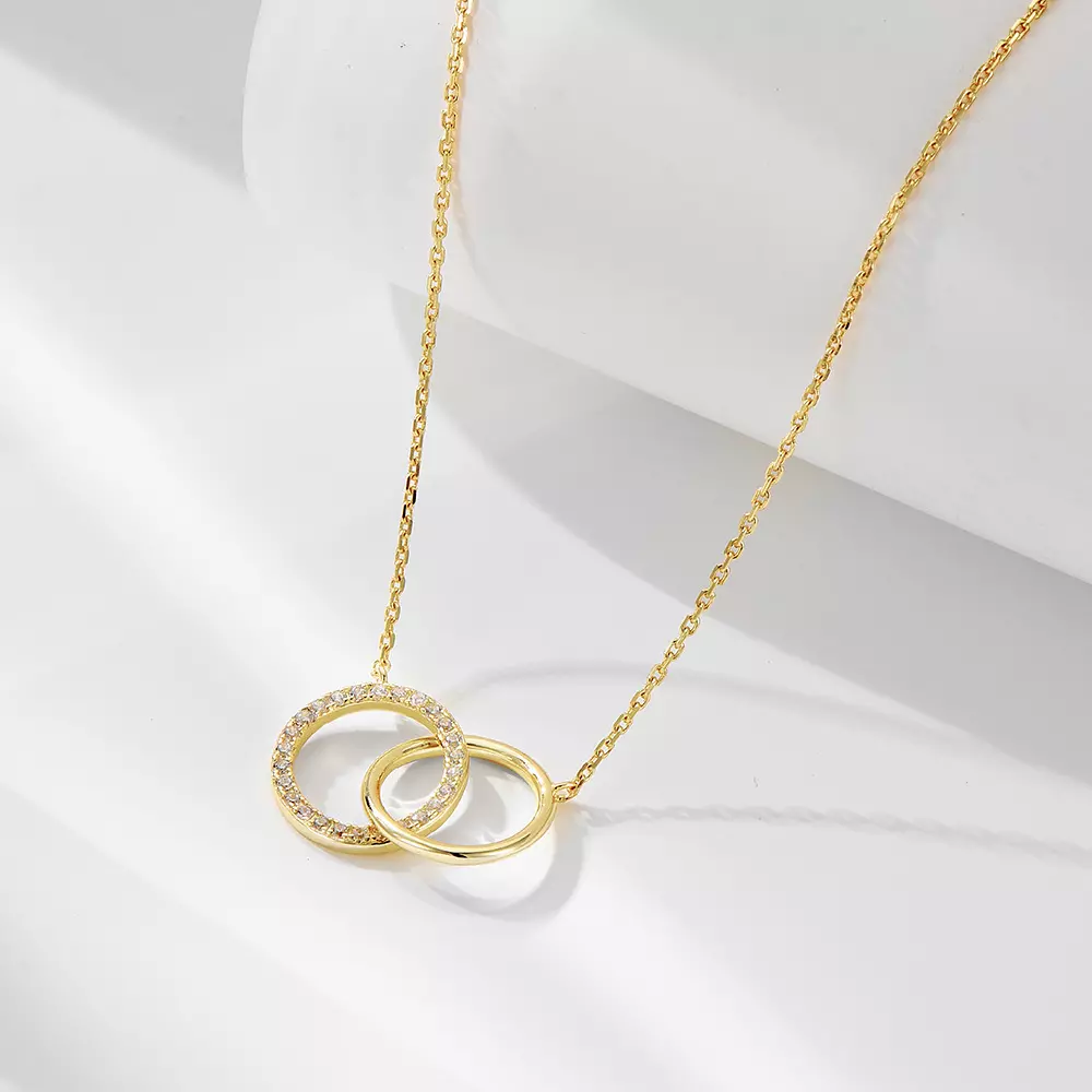 Gold and silver diamond-studded circular double-ring interlocking necklace